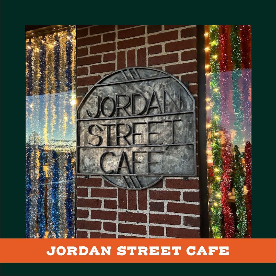 A brick building with a sign that says jordan street cafe