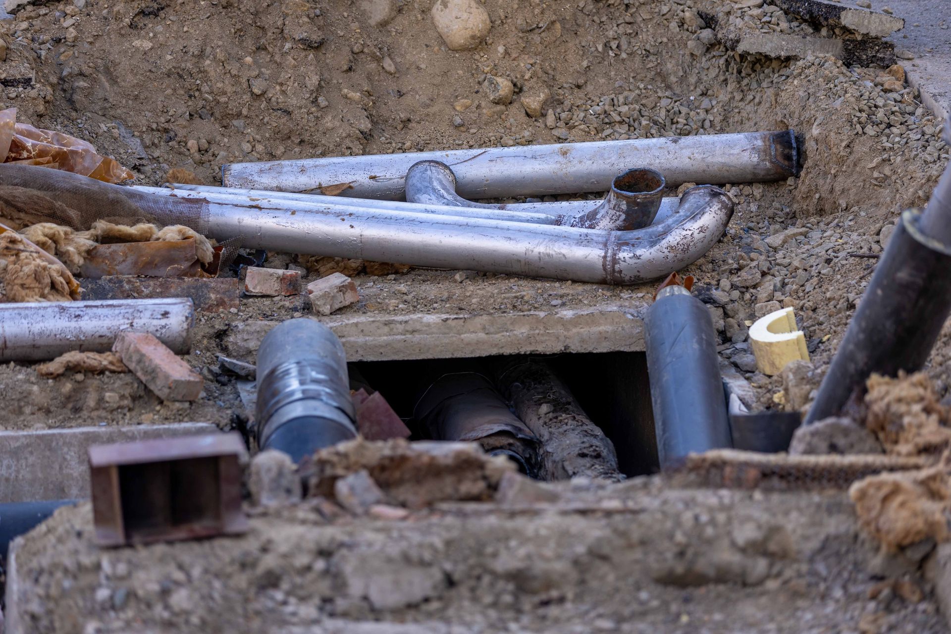 Pipe installation at an urban construction site