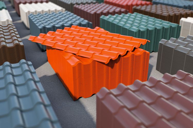 Stacks of colorful corrugated metal roofing panels. Stacks of colorful corrugated metal roofing panels.
