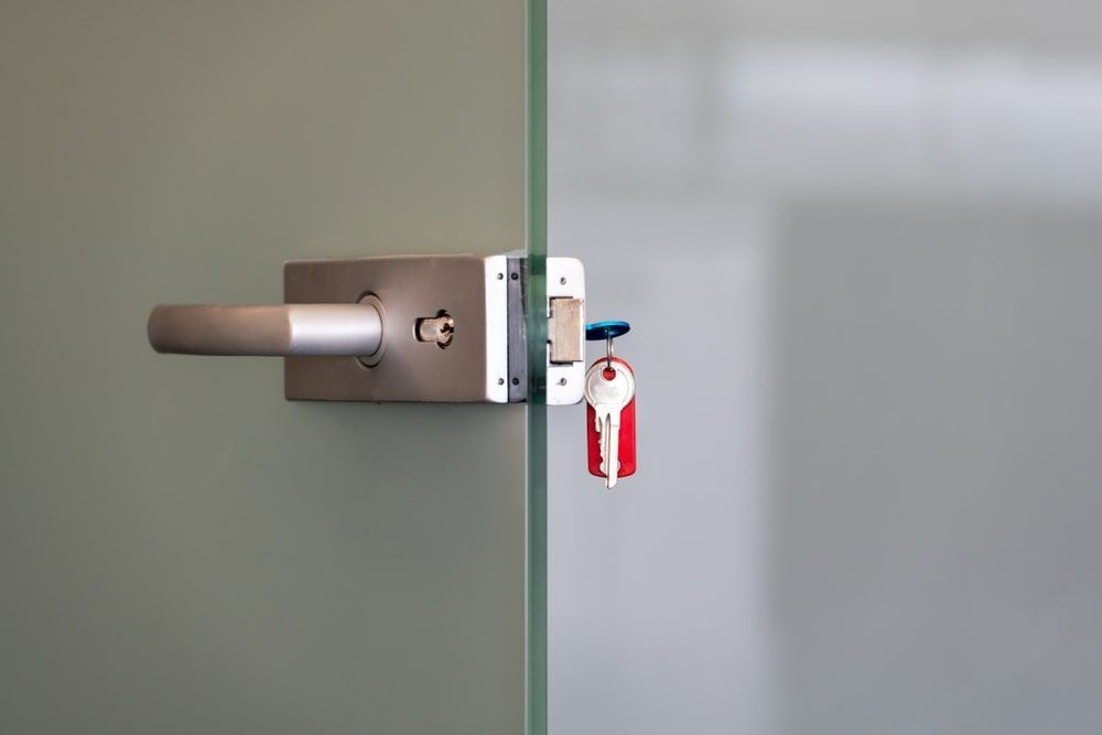 A Close Up Of A Door With A Key In It
— Troy Cummings Locksmith In Bungalow, QLD