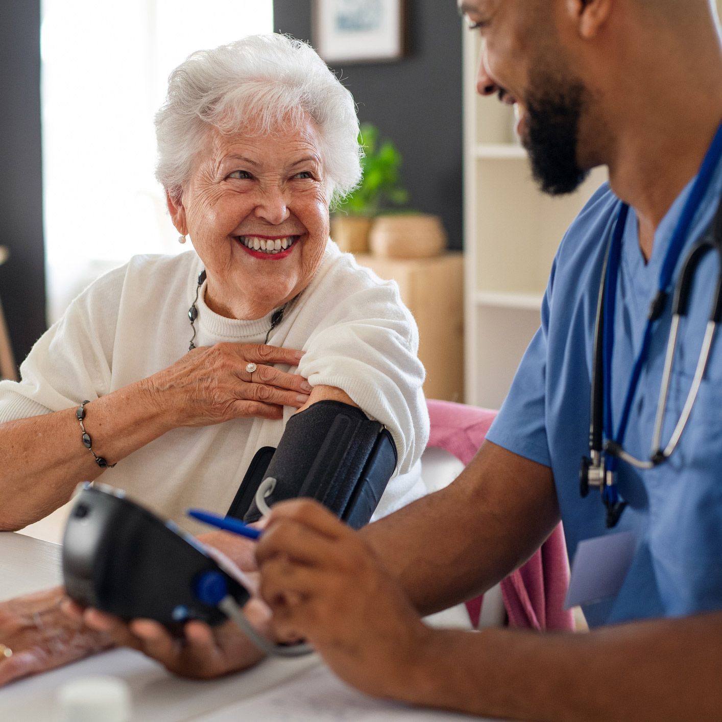 Senior Checking the Blood Pressure — Hollywood, FL — Tradition Homecare Senior Checking the Blood Pressure — Hollywood, FL — Tradition Homecare