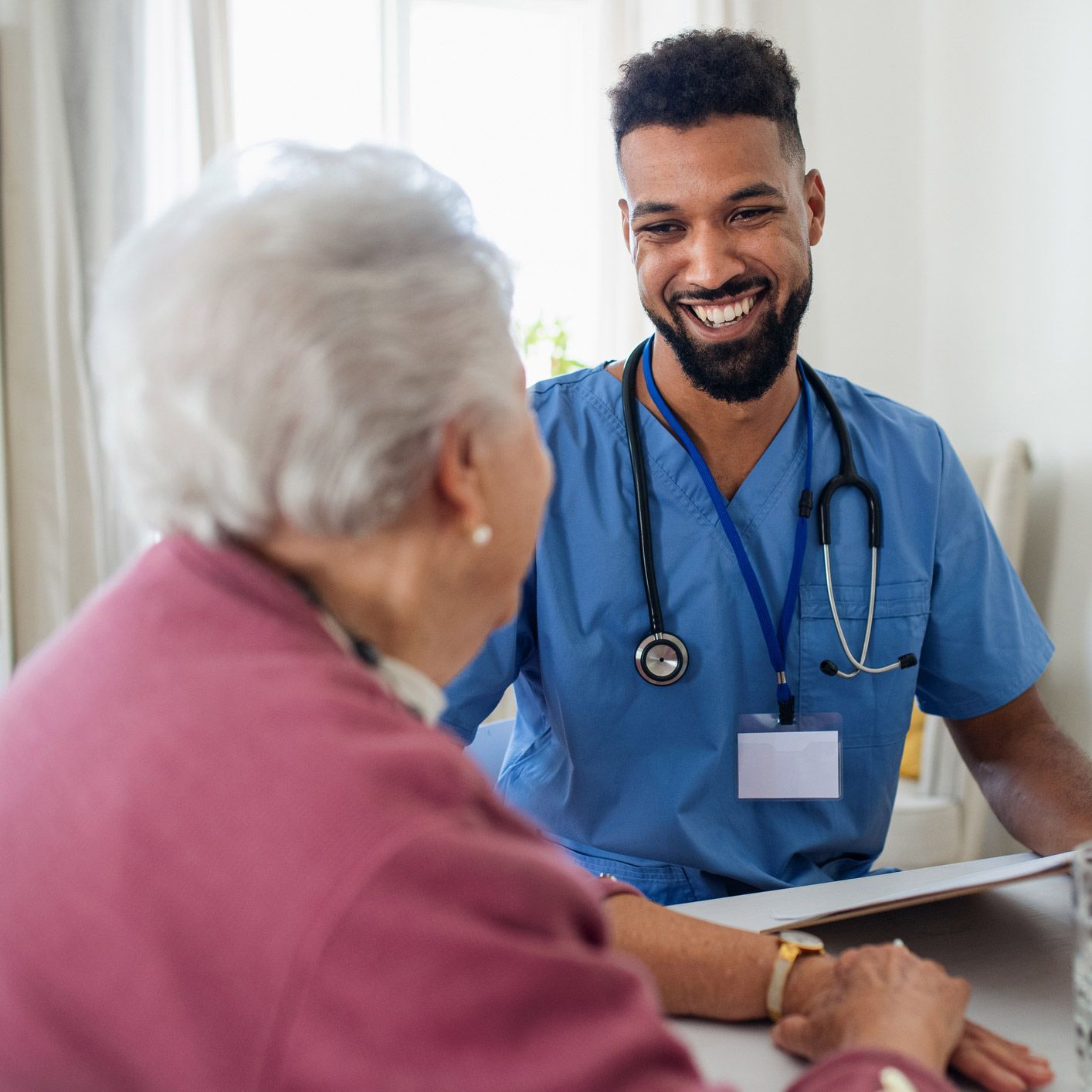 Home Visit of Male Caregiver — Hollywood, FL — Tradition Homecare Home Visit of Male Caregiver — Hollywood, FL — Tradition Homecare