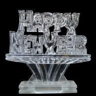 Clear ice sculpture “Happy New Year” tabletop decoration on a stand
