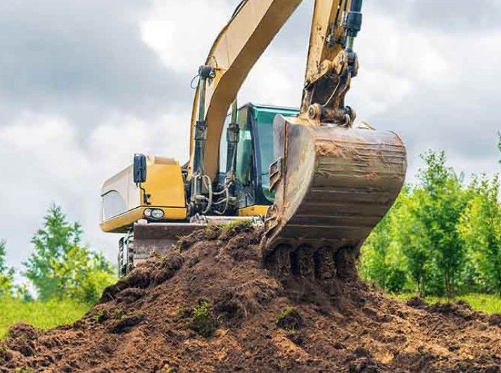 Earthmoving Dubbo Excavator Moving Soil On Worksite