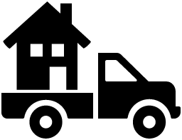 A house is being towed by a truck.