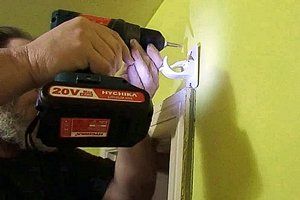 Hanging curtains in plaster using the Hychika drill.