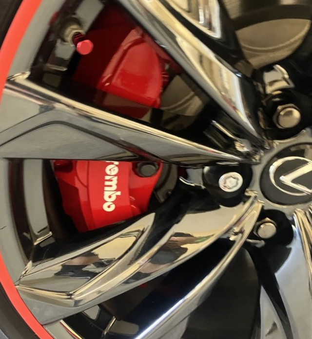 A close up of a brembo brake on a lexus