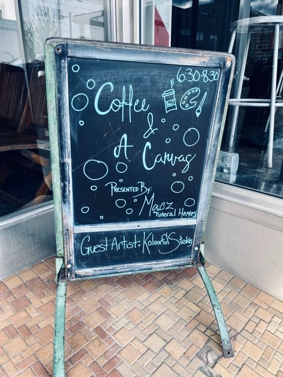 A-frame chalkboard sign advertising 