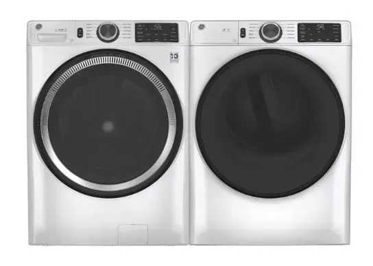 A washer and dryer are sitting next to each other on a white background.