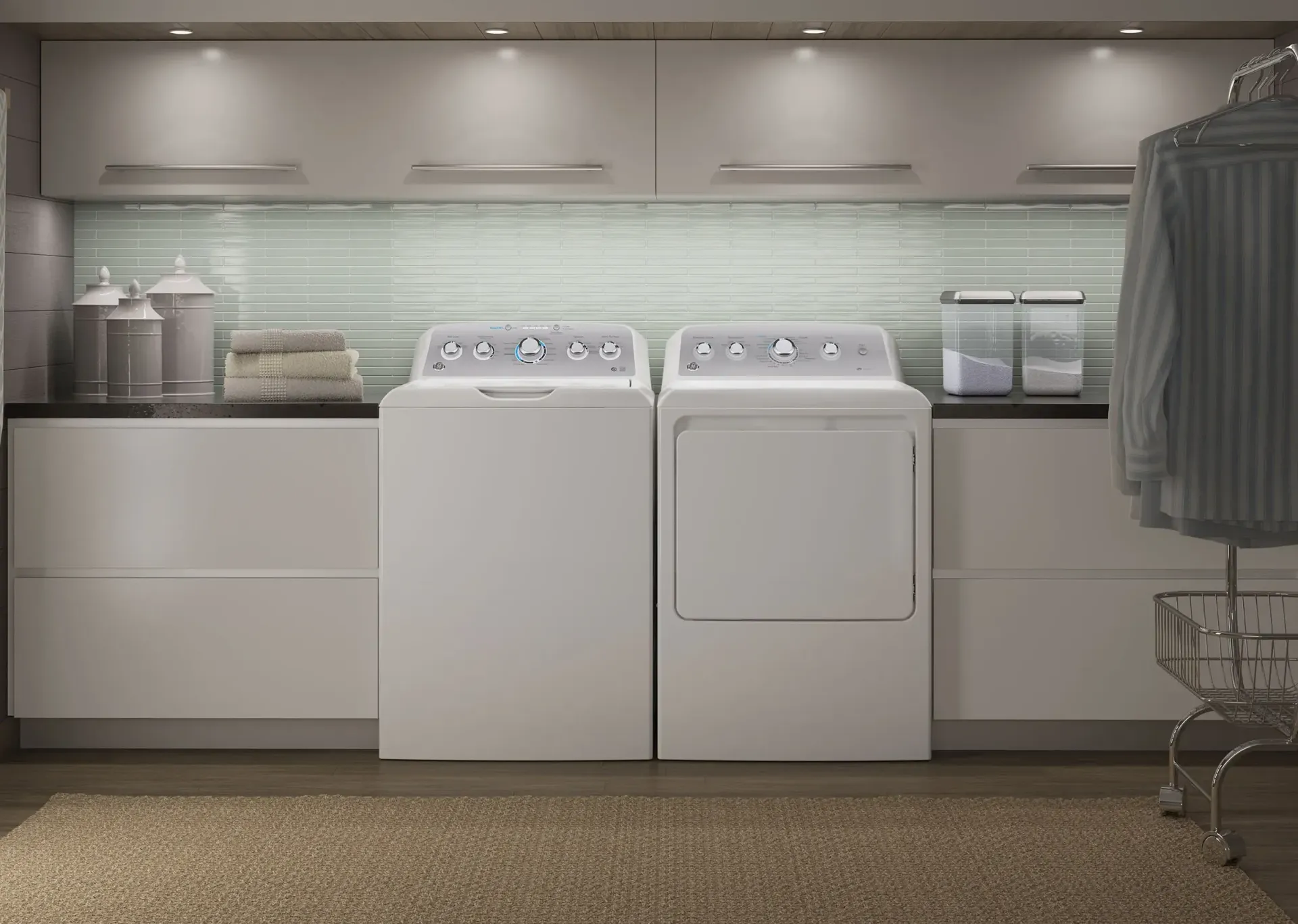 A laundry room with a washer and dryer in it.