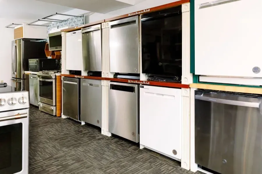 There are many different types of appliances in this room.