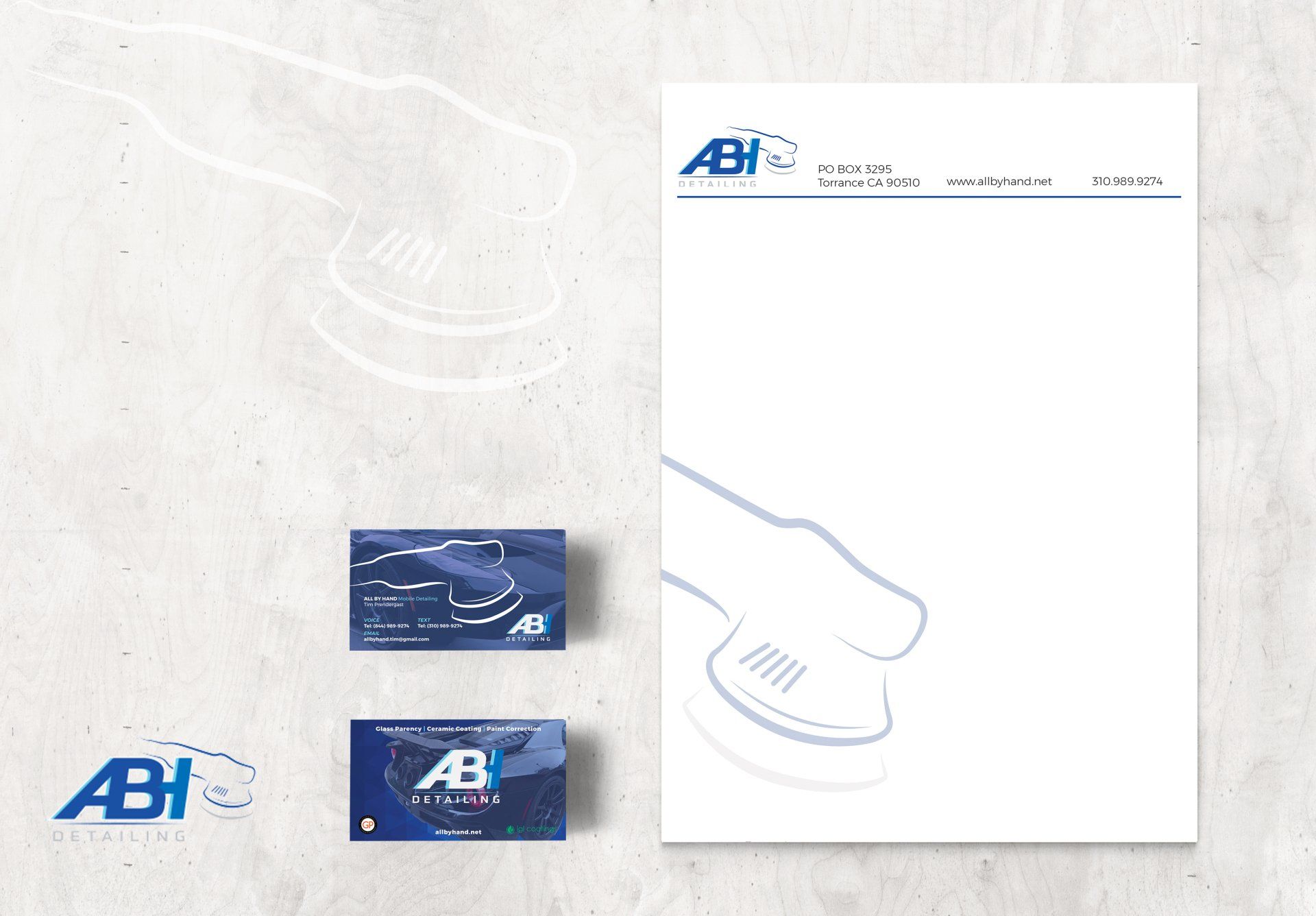 a set of business cards and a letterhead for a company called ab