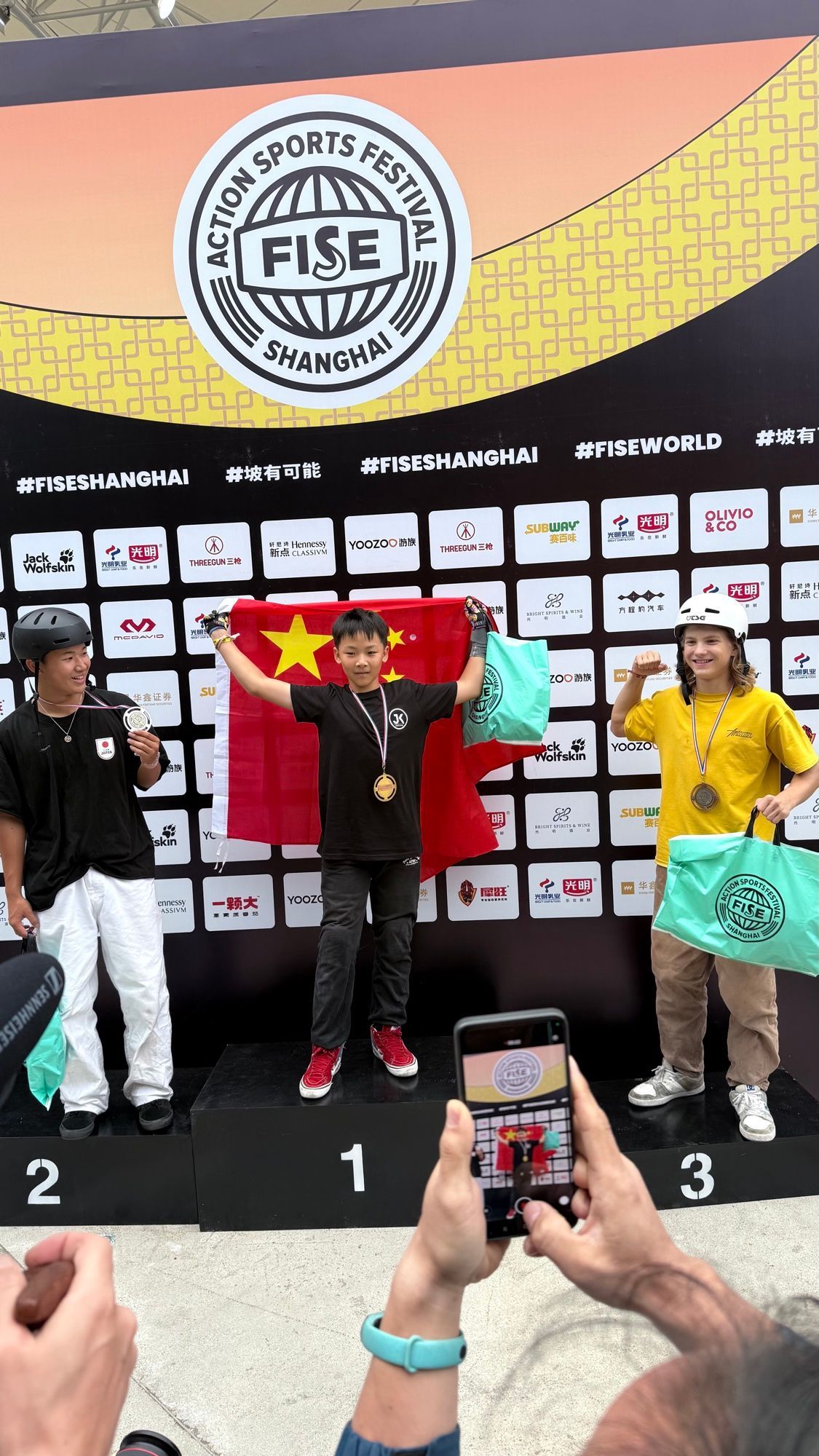JKC rider celebrating a first-place finish at FISE Shanghai