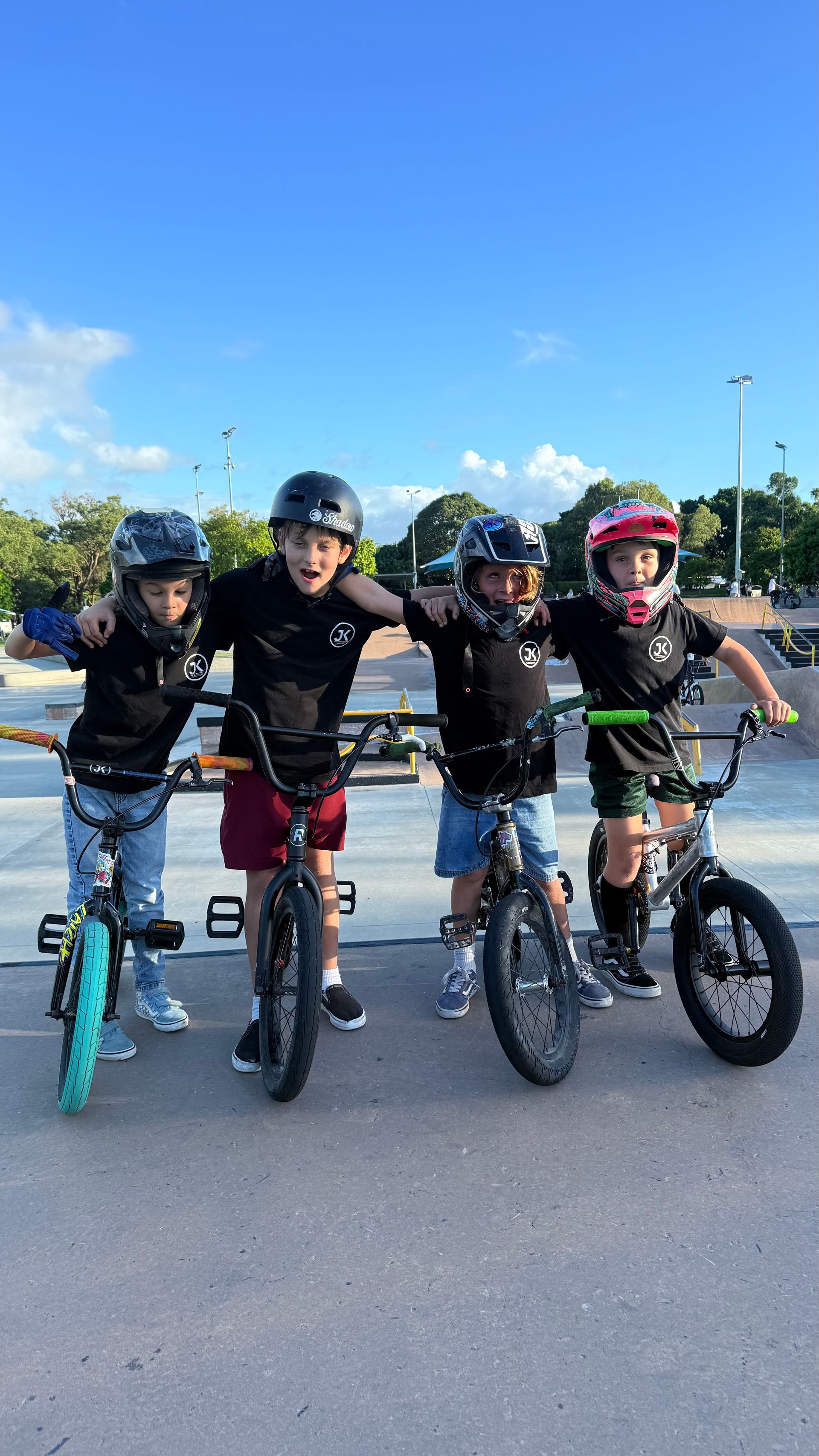 Young JKC BMX riders together at the skatepark