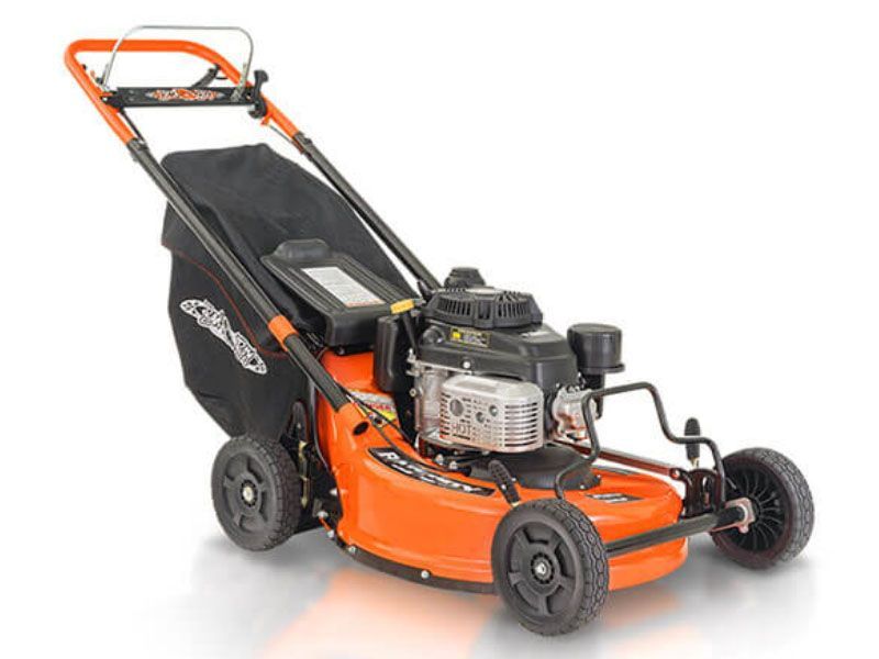 Orange and black push lawn mower on a white background