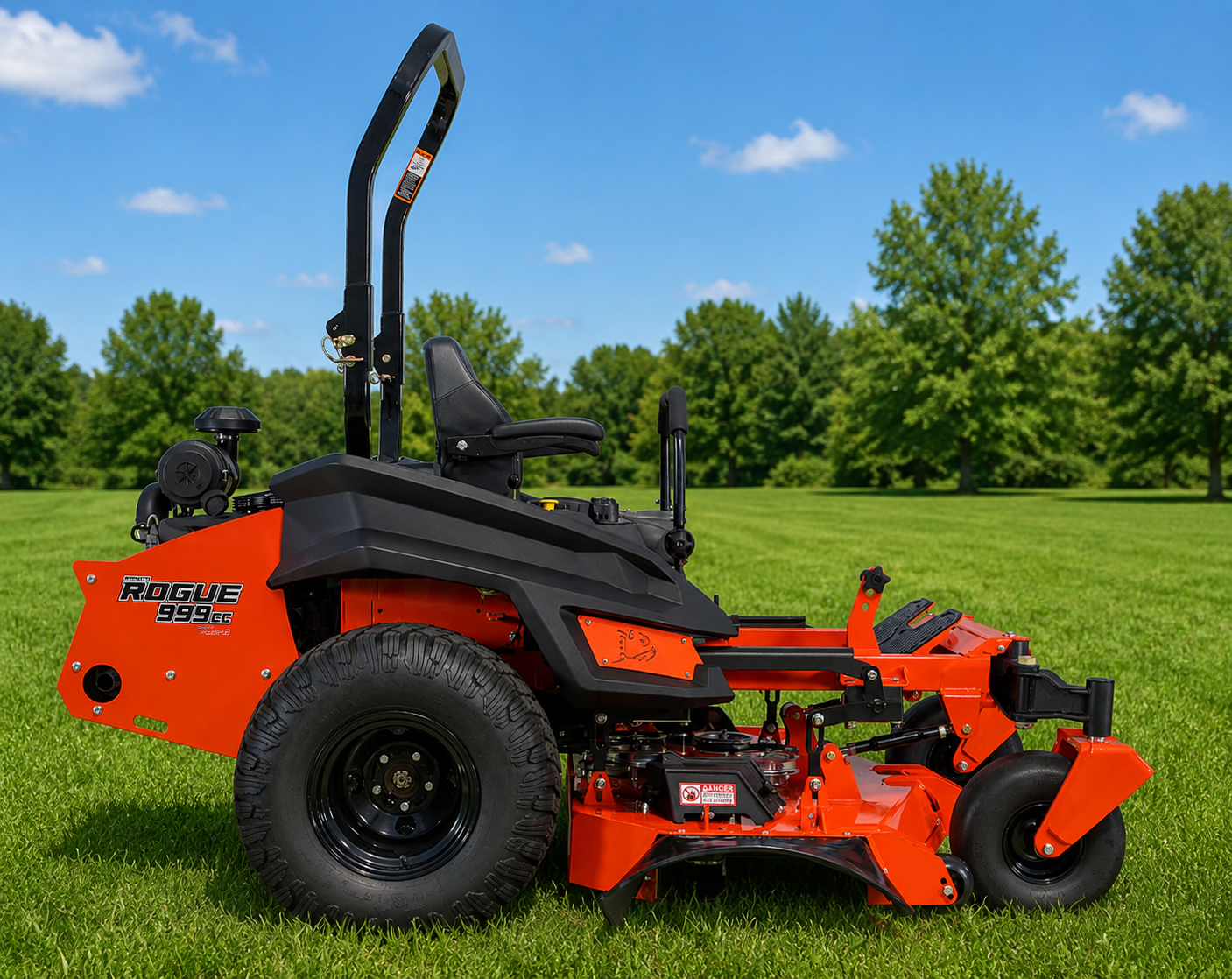 Orange zero-turn lawn mower on green grass in a sunny field with trees
