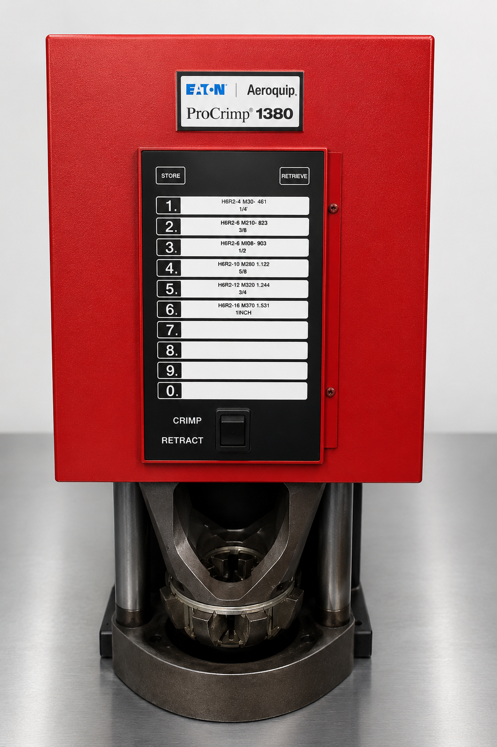 Red beverage machine with selection buttons and a clear lower chamber, standing on a metal counter.