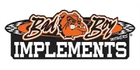 Bad Boy Implements logo with orange bulldog head and bold black-and-white text