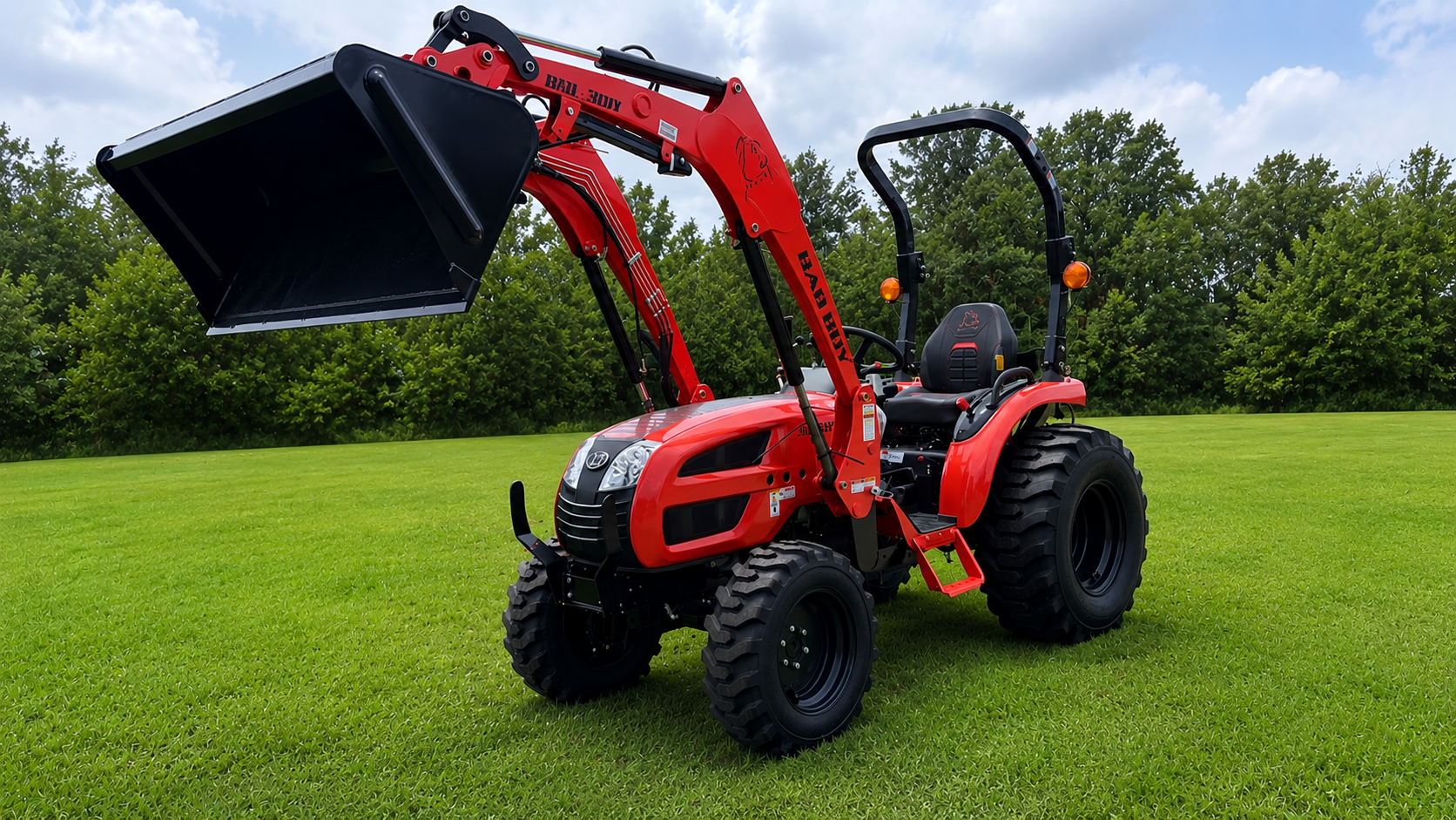 Red tractor with front loader on a grassy field under trees