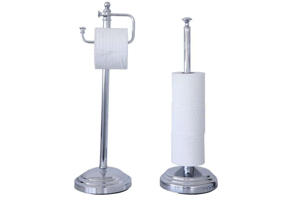 Dos portarrollos de papel higiénico cromados. Uno sostiene el rollo horizontalmente, el otro verticalmente.