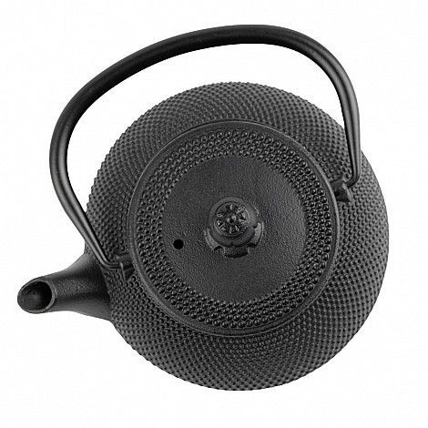 Tetera de hierro fundido negro con superficie texturizada y asa curva.