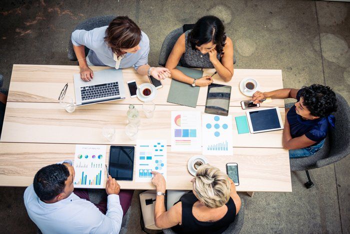 Financial Professionals Preparing Tax Paperwork — Perth, WA — Allen & Co Business tax accounting services in progress in Osborne Park