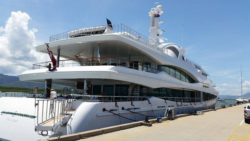 A Large White Yacht is Docked at a Dock — Seabourne Electronics PTY Ltd in Railway Estate, QLD
