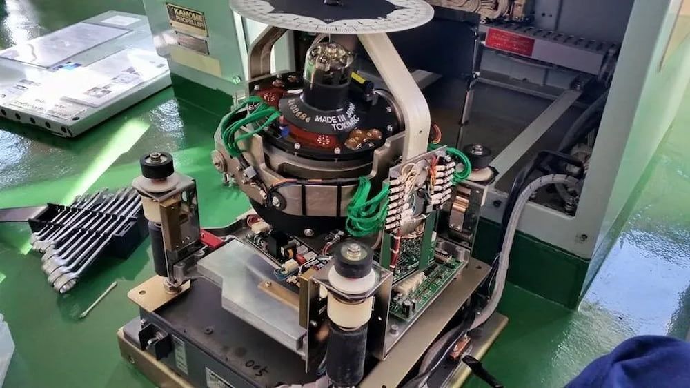 A Person is Working on a Machine in a Factory — Seabourne Electronics PTY Ltd in Railway Estate, QLD