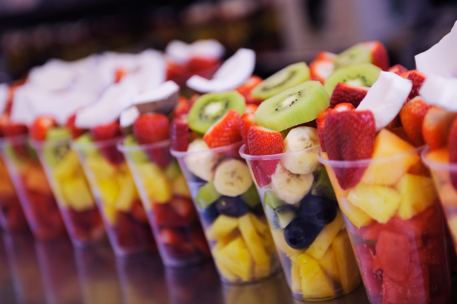 colorful fruit in clear plasict cups