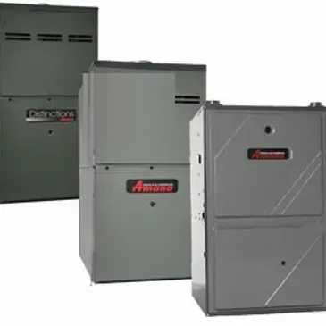 Three gray Amana furnaces or HVAC units displayed against a white background