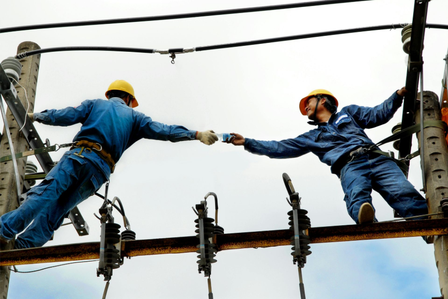 Certified electrician performing residential electrical repair