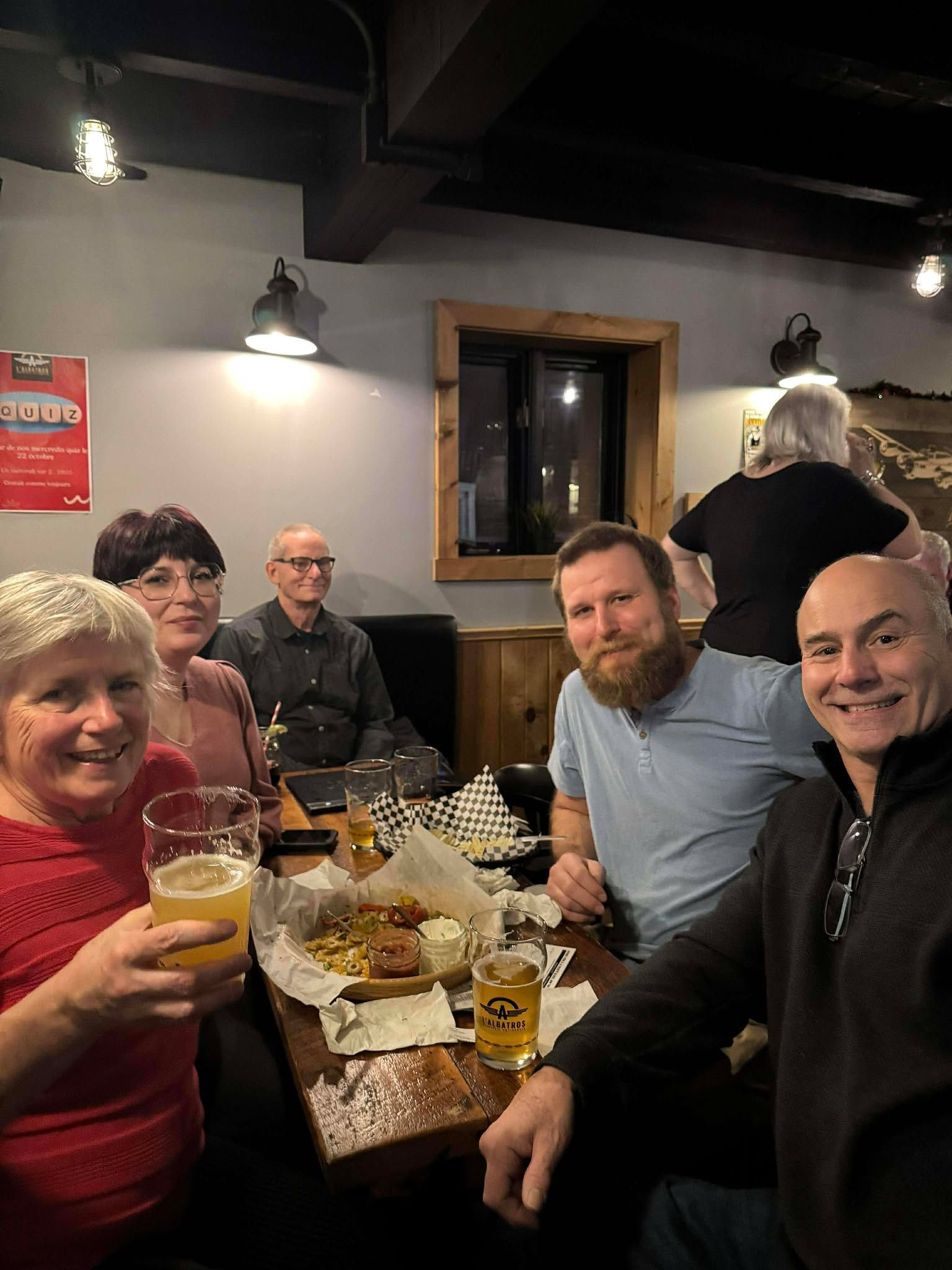 Smiling people sitting at a table