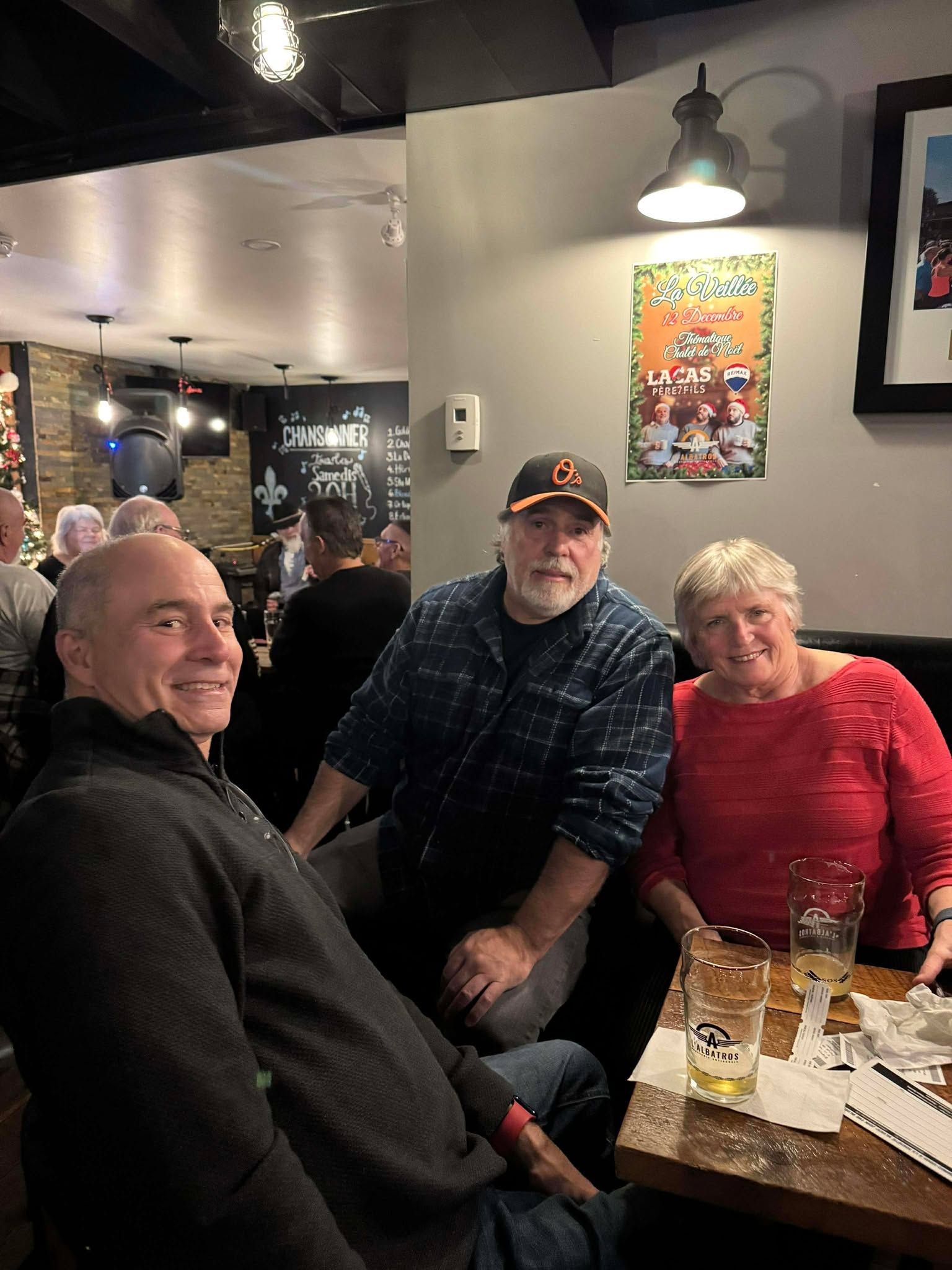 Smiling people sitting at a table