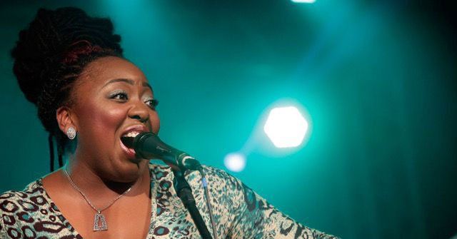 Annika Chambers microphone blue backlight