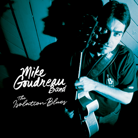 Mike Goudreau holding a guitar on the cover of his CD