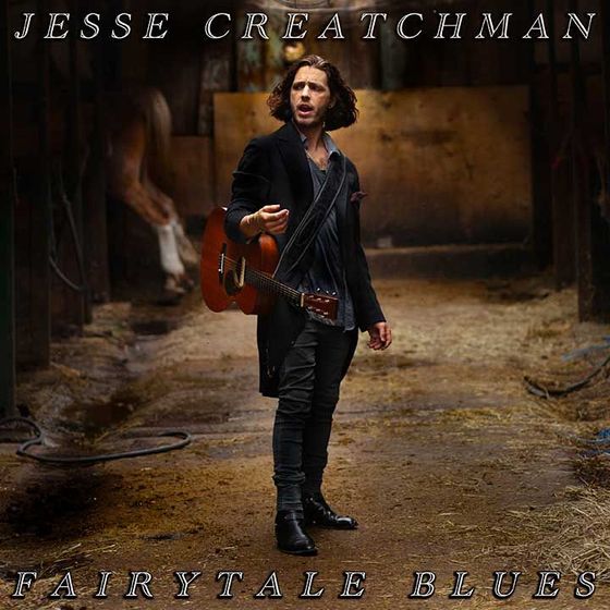 Album cover of Fairytale Blues featuring Jesse Creatchman holding a guitar in a barn.