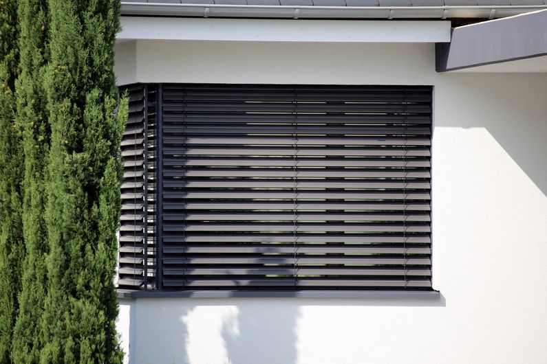 Black window shutter.