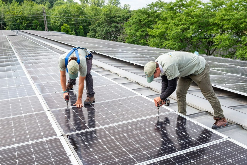 Men Installing Solar Panels - Bristol, VT - Mountain Energy Design Men Installing Solar Panels - Bristol, VT - Mountain Energy Design