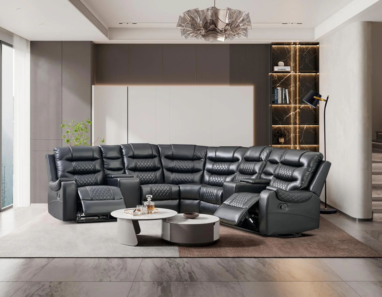 Black leather sectional sofa in modern living room with coffee table and reclined seats.