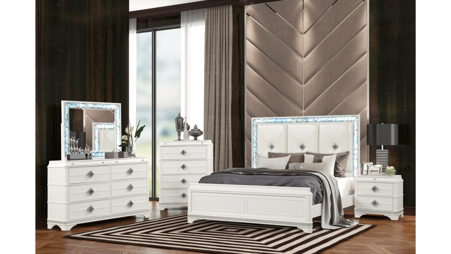 White bedroom furniture set with crystal accents; includes bed, dresser, chest, mirror, and nightstand.