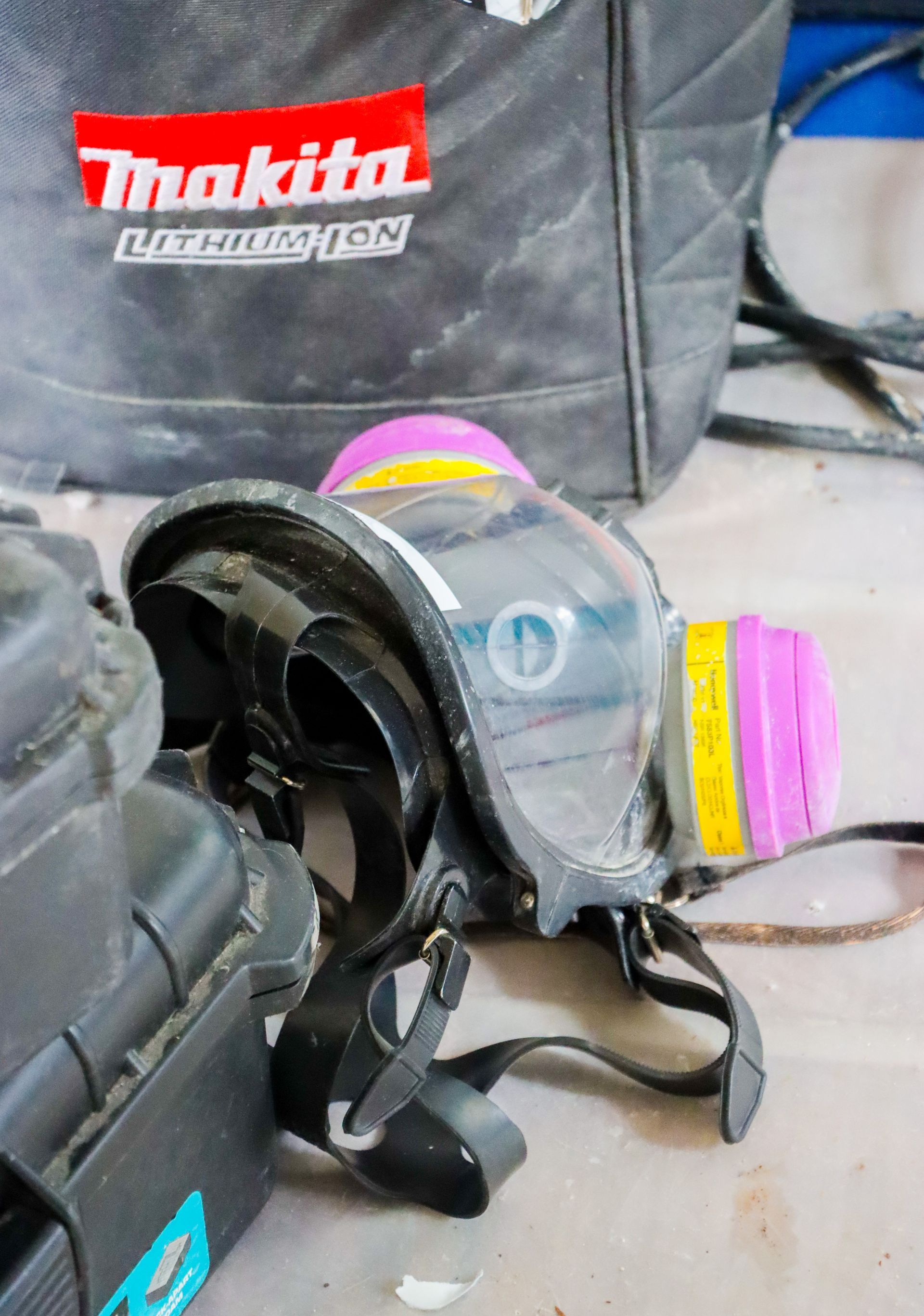 A makita gas mask is sitting on a table