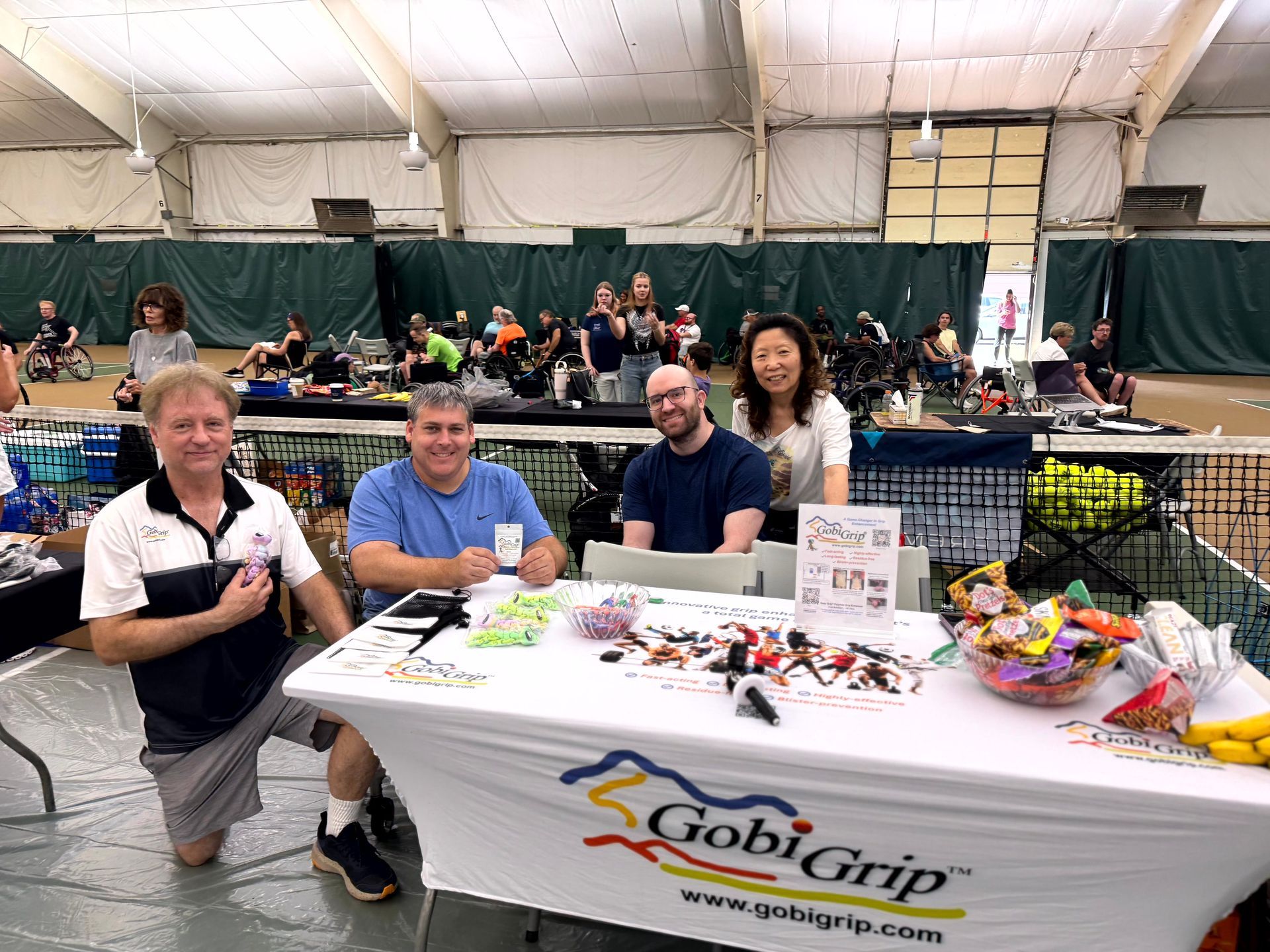 Gobi Grip team with wheelchair tennis players at the USTA Level 2 St. Louis Indoor Wheelchair Tennis