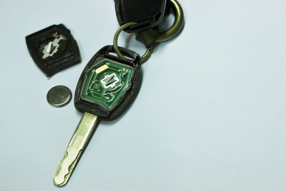 Green Key on a Keyring With a Loose Black Cap — Battery Assist Brisbane in Chermside, QLD