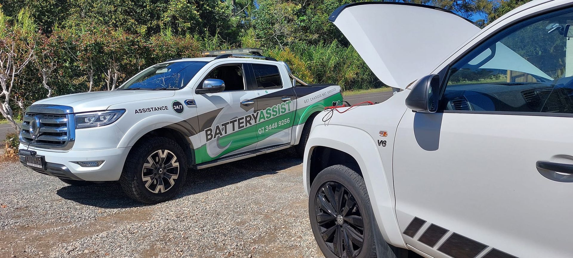 Two White Pickup Trucks  — Battery Assist Brisbane in Caboolture, QLD
 