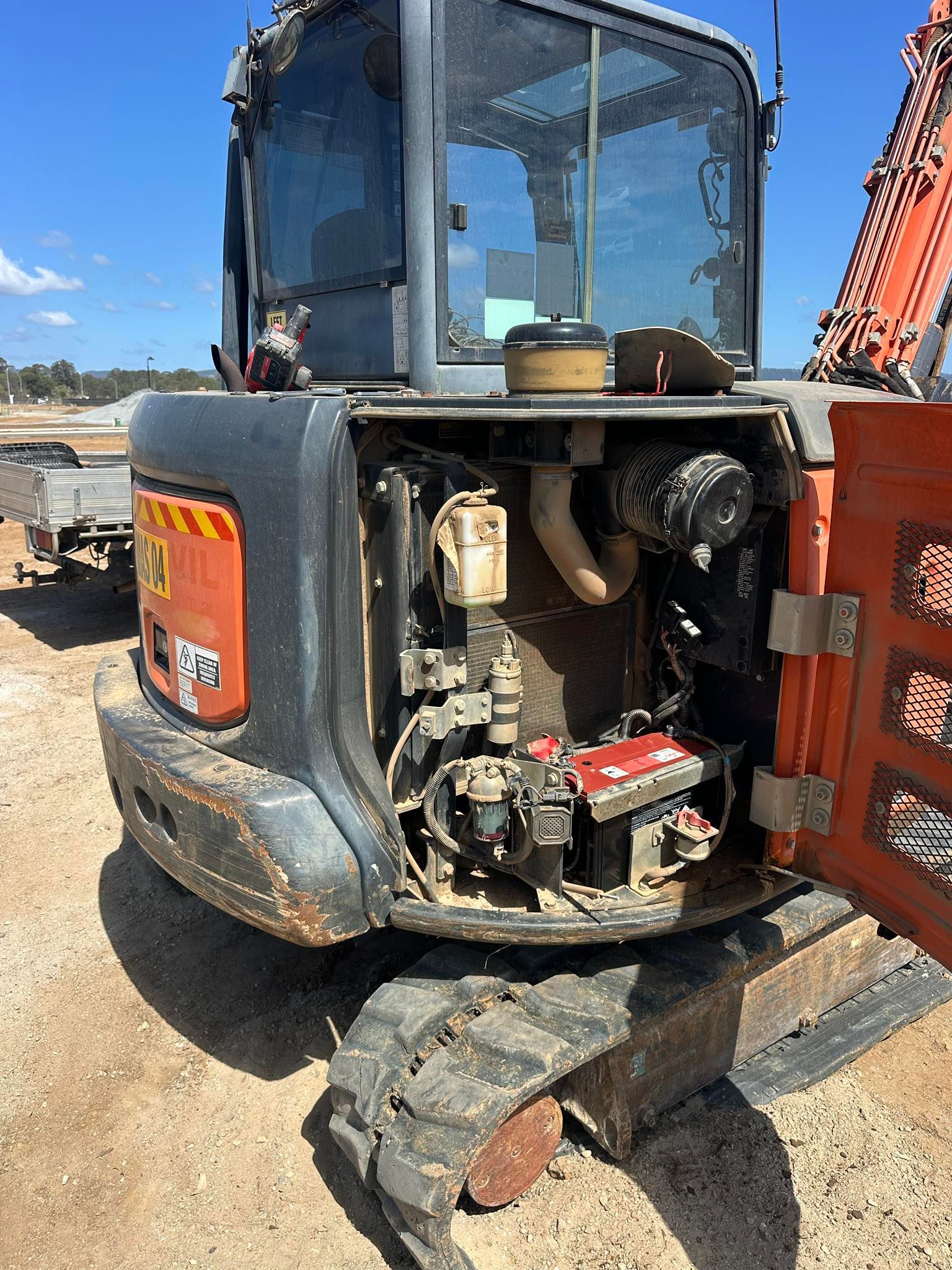 Construction Machine With Open Side Panel — Battery Assist Brisbane in Aspley, QLD