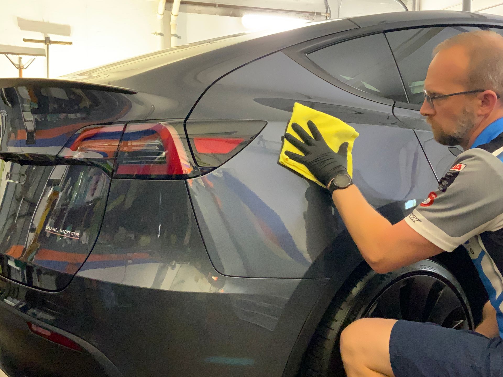 Ceramic Coating Wiping Tesla Model Y