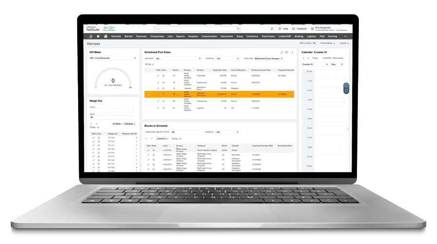 A photo of a laptop with a Doozy TotalAg NetSuite SuiteApp dashboard
