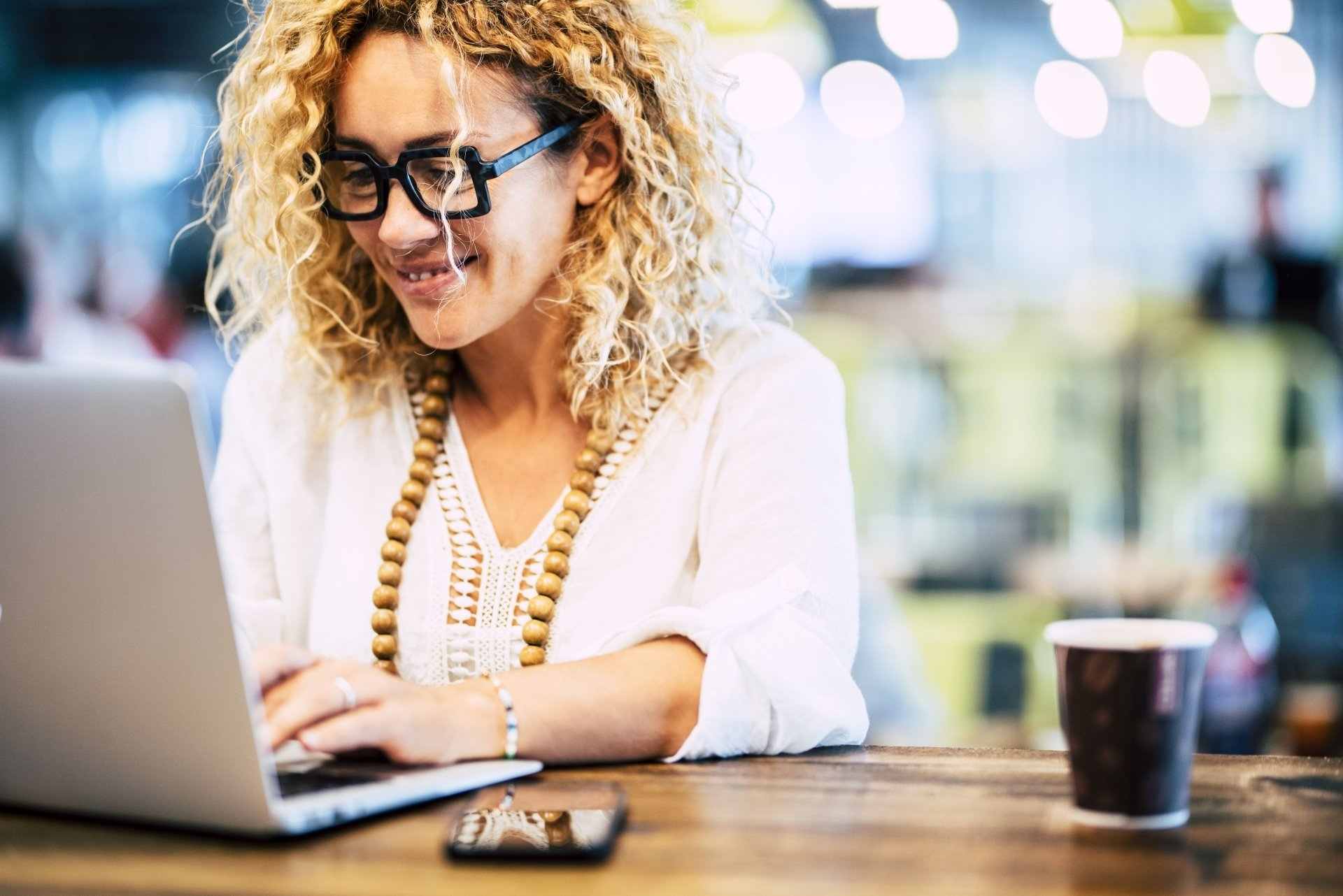Happy woman at computer