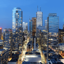 An aerial view of a city skyline at night