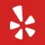 White Yelp logo on a red background